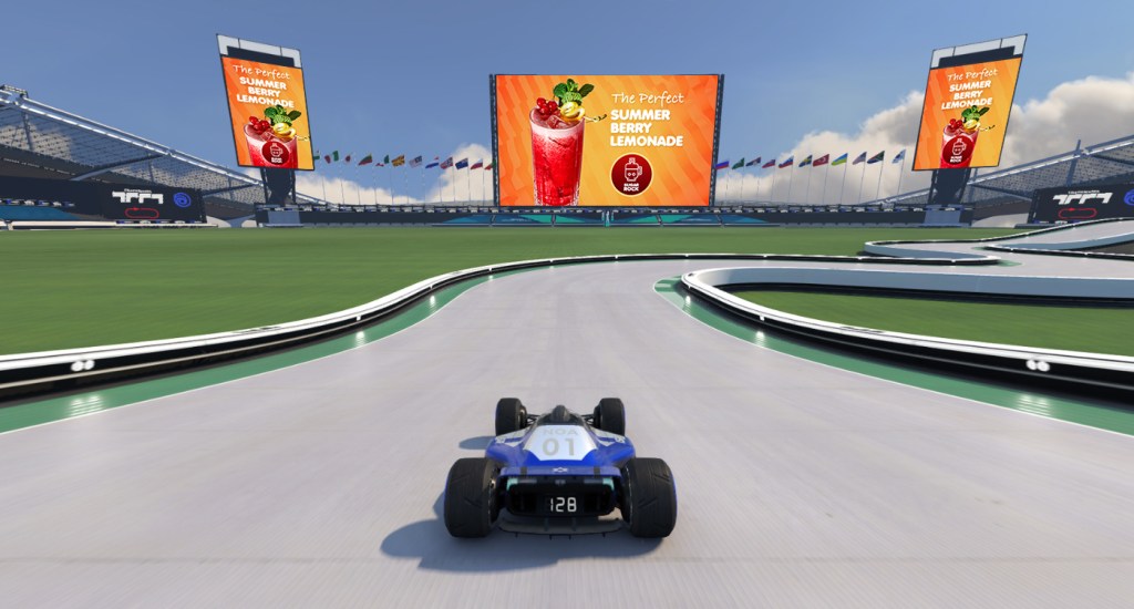 Example of in-game advertising with an ad for summer berry lemonade on a billboard above a racetrack in a racing video game.