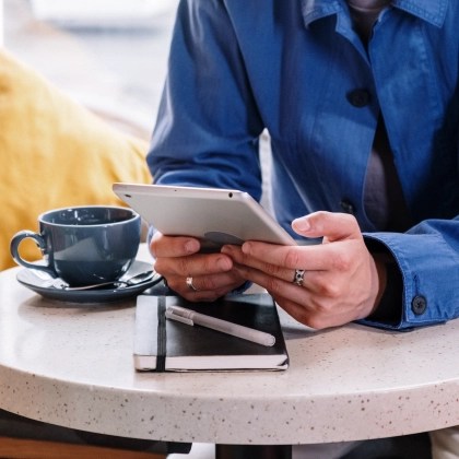 Person reading political advertising on a tablet